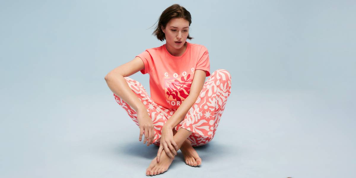 Woman wearing coral pyjamas